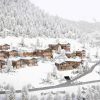 Die_Amonti_Chalets_im_Winter.png