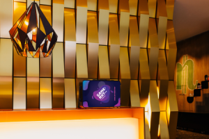 nhow_Frankfurt_Lobby_gaming_suitcase_front_desk_floor_view.png